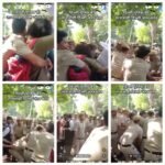 Look at the way a policeman is grabbing a woman’s chest from behind